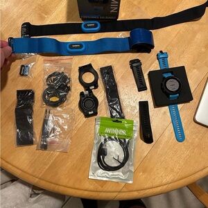 Garmin Forerunner 945 with Blue and Black Accessories